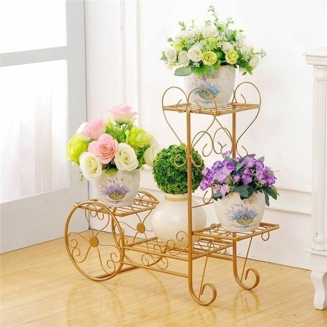 golden flower pot holder